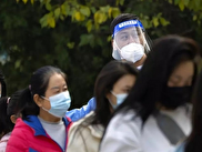 کاهش برخی محدودیت‌های کرونایی در چین/ نگرانی کارشناسان از اوج‌گیری بیماری